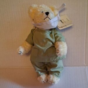 Plush Teddy Bear in Green Outfit